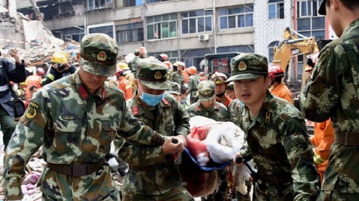 China building collapse kills at least 22